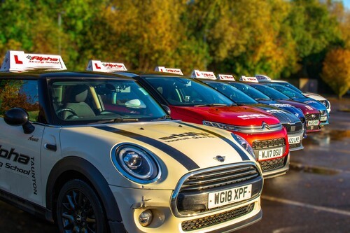 Car line-up at Alpha Driving School